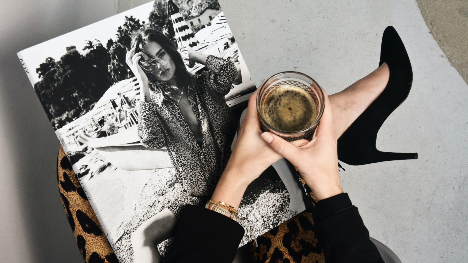 woman with a coffee and a magazine