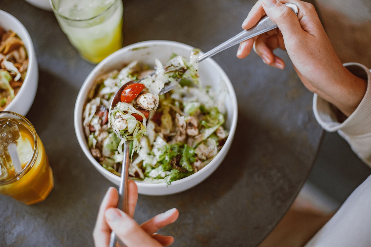 woman eating a salad